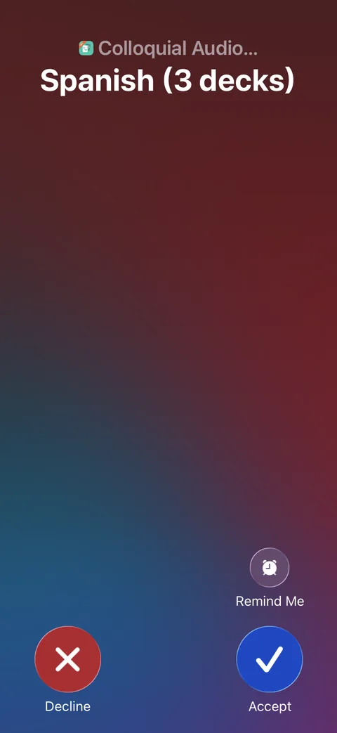 A locked iPhone showing an incoming call from Colloquial Audio Flashcards, with the caller name Spanish (3 decks) and the standard Decline, Accept and Remind Me buttons